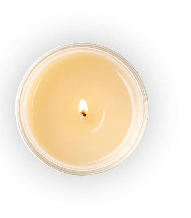 A single lit candle on a black background, casting a warm glow.