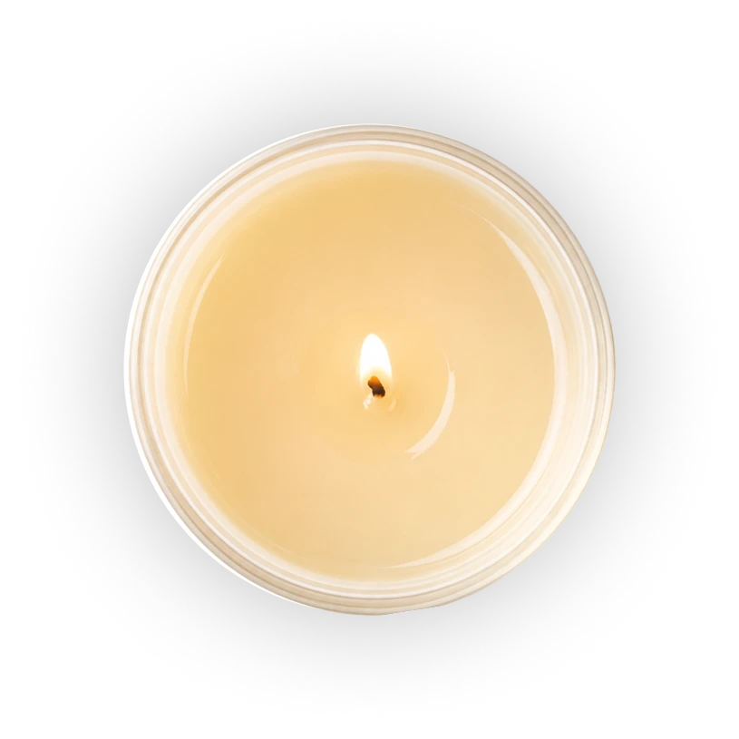 A single lit candle on a white background, casting a warm glow.