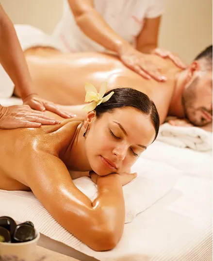 Woman receiving a back massage from a man in a wellness center, Son, Netherlands.