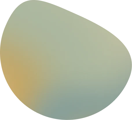 A round, white object with a yellowish hue on a black background, possibly a laser device or equipment.