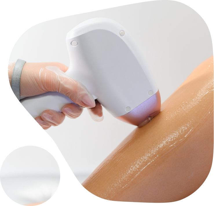 A person holding a hairdryer, drying their hair