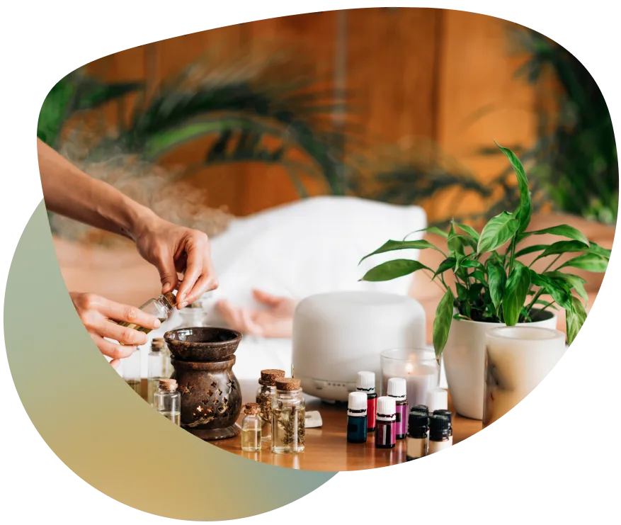 A person receiving a massage with organic oil in a peaceful environment